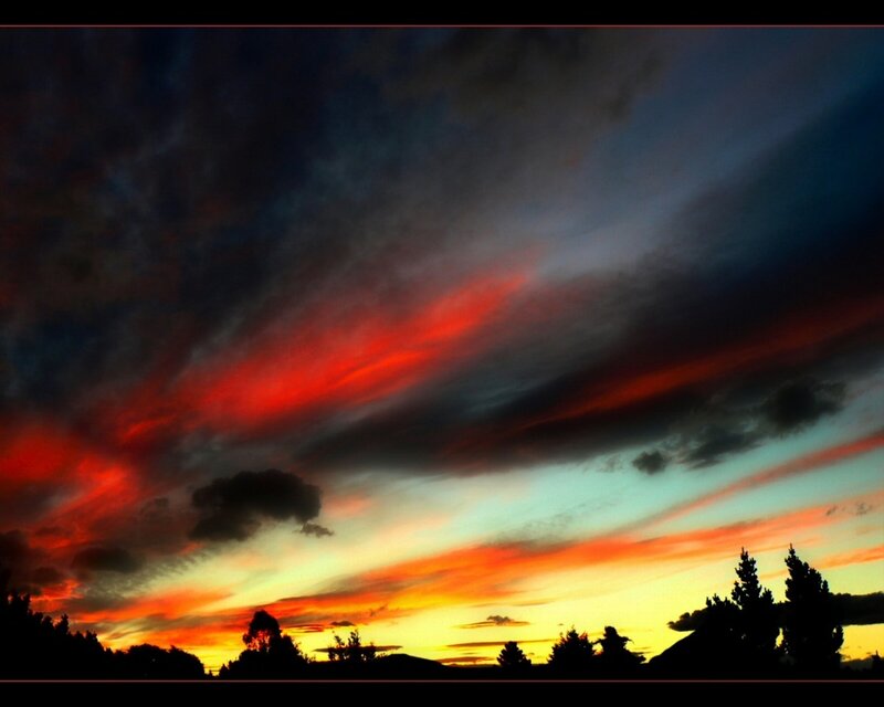 dramatic sunset with red clouds