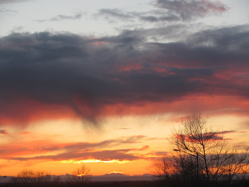dramatic sunset with storm clouds