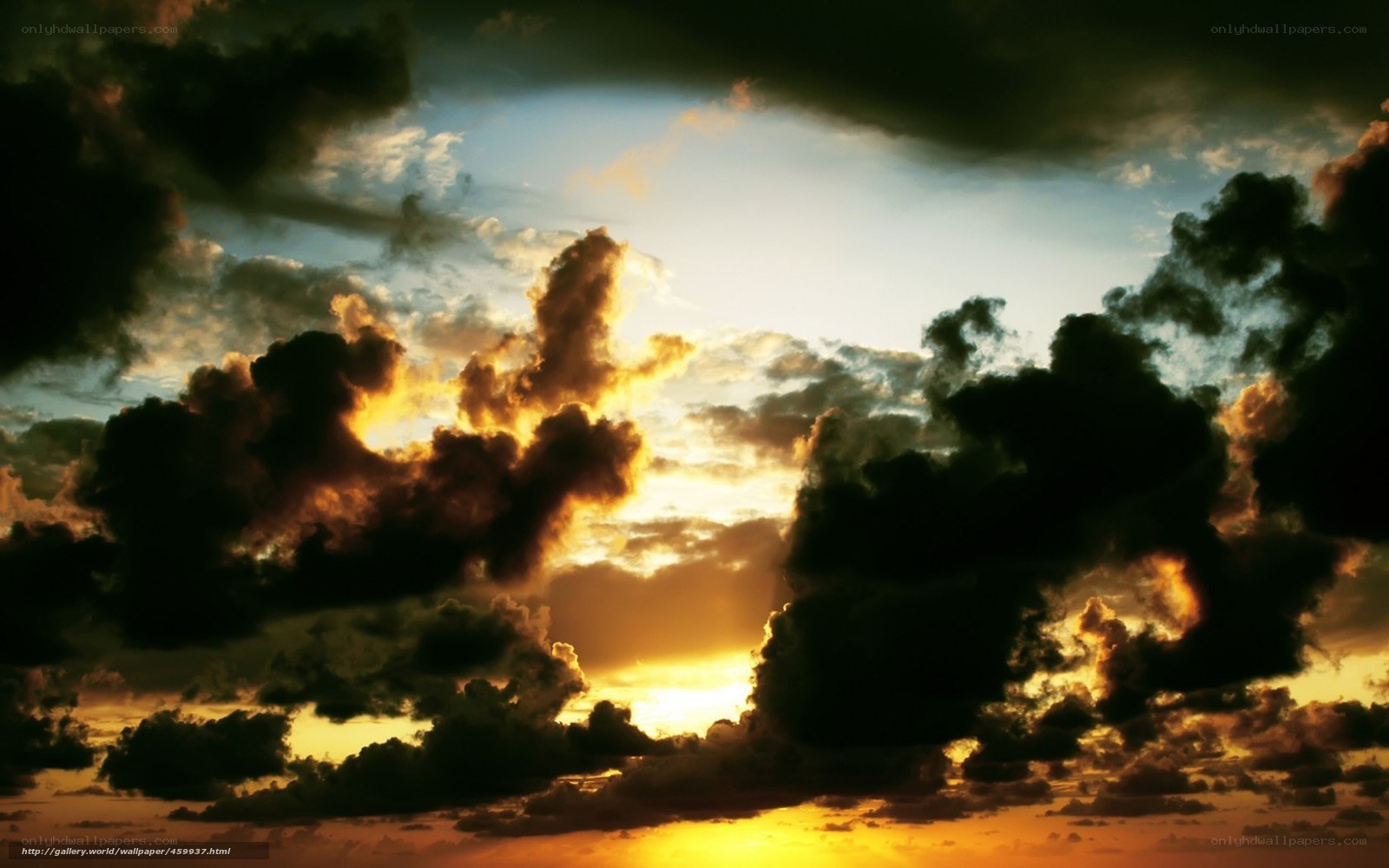 Dramatic sunset with storm clouds
