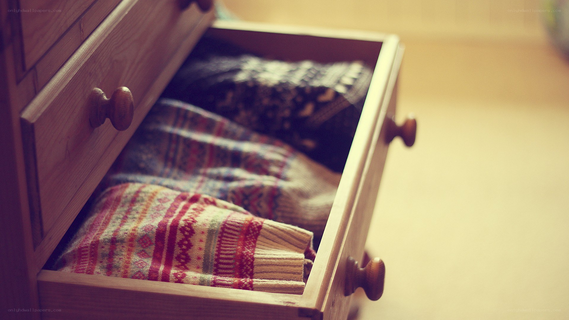 drawer with sweaters