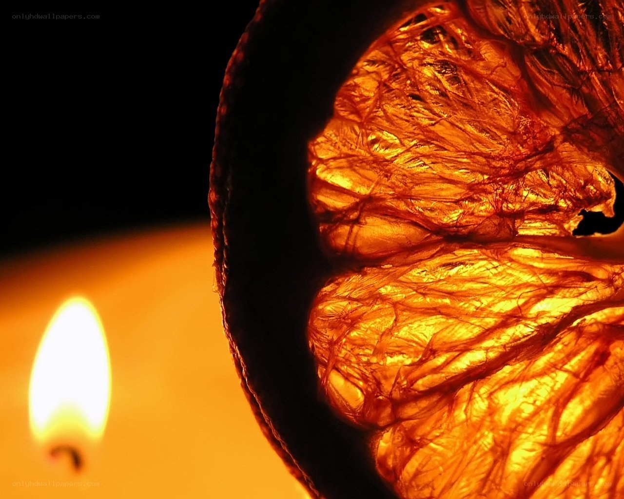 Dried orange slice with candle