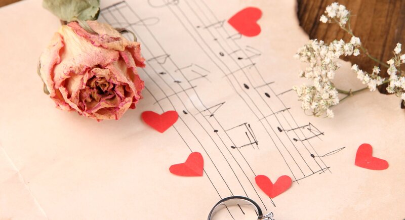 Dried Rose on Sheet Music — Pink