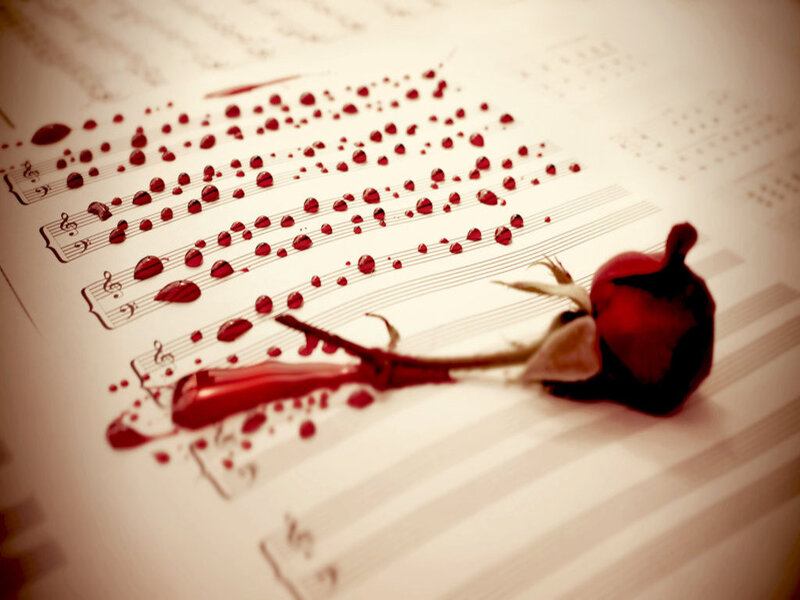Dried Rose on Sheet Music — Red