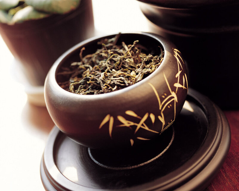 Dried tea leaves in a bowl