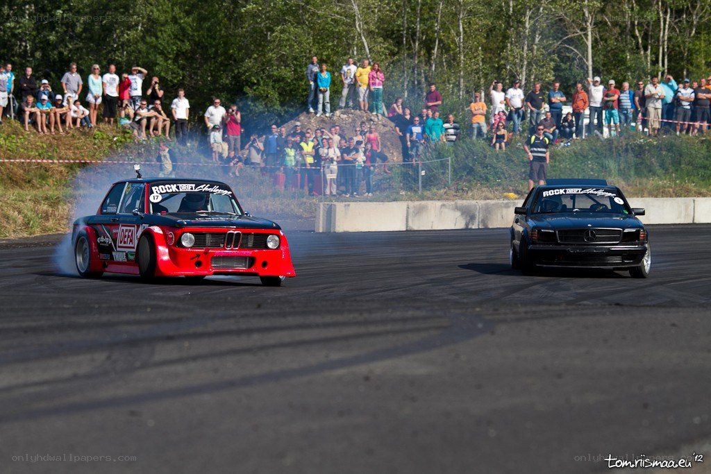 Drift cars at a race