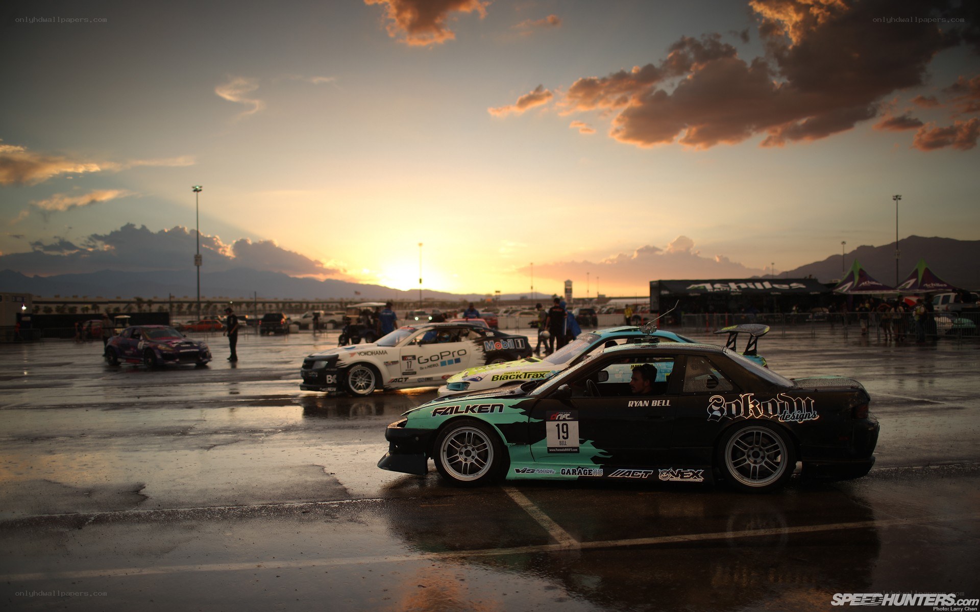 Drift cars at sunset