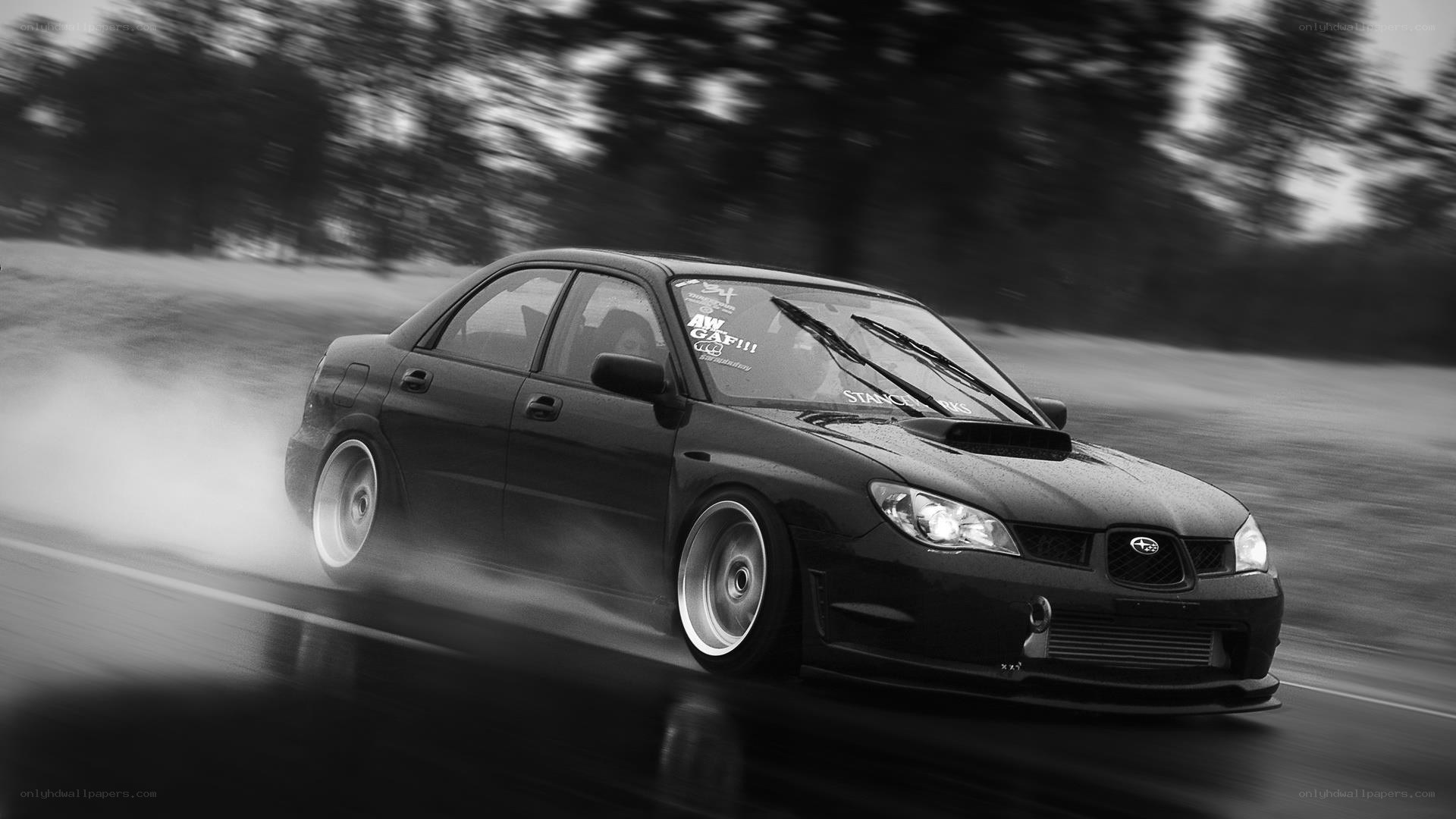 drifting black car on track
