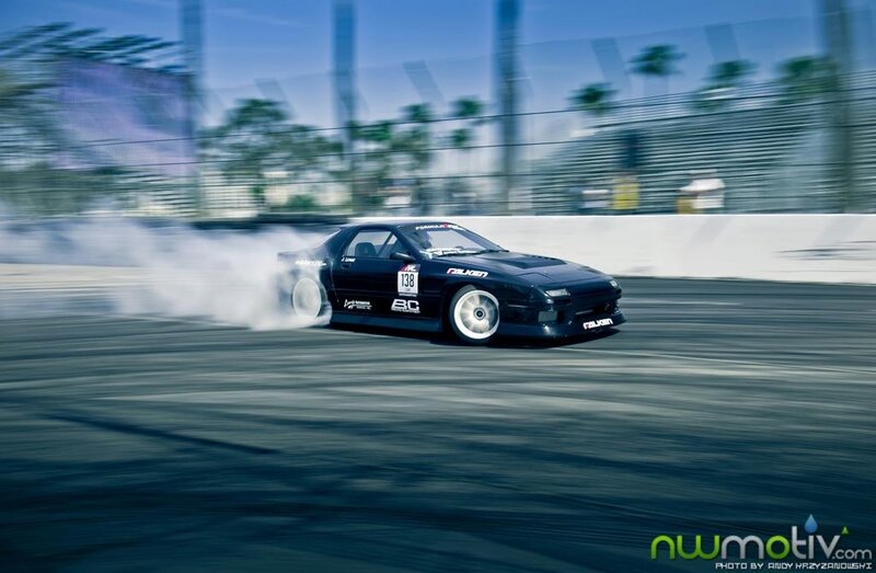 Drifting black sports car