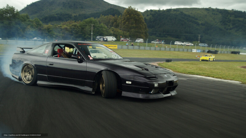 Drifting black sports car
