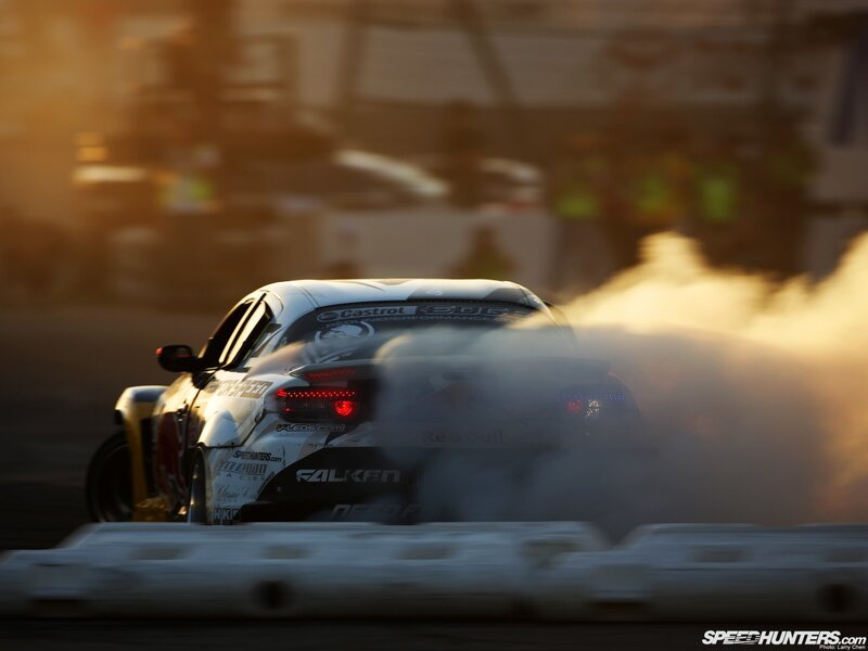 Drifting car at sunset