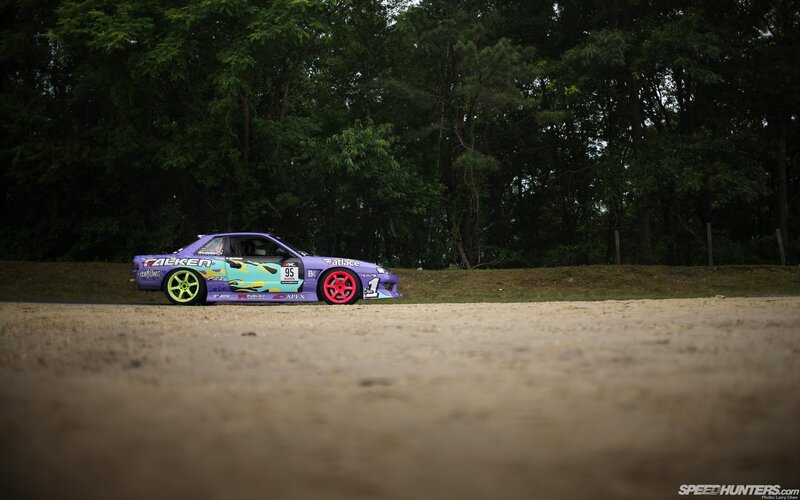 drifting car on dirt track