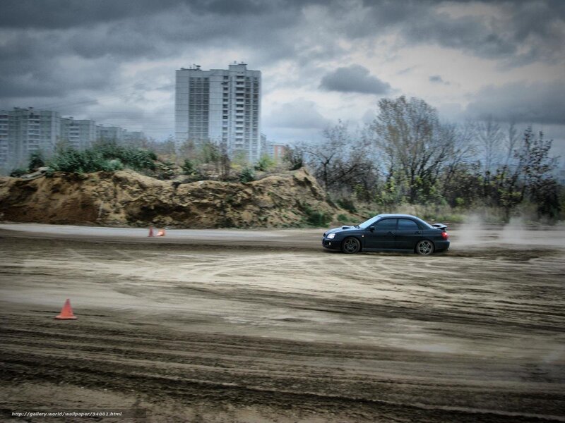 Drifting car on dirt track