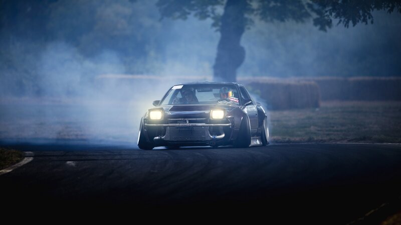 Drifting Car on Track — Black, Dramatic