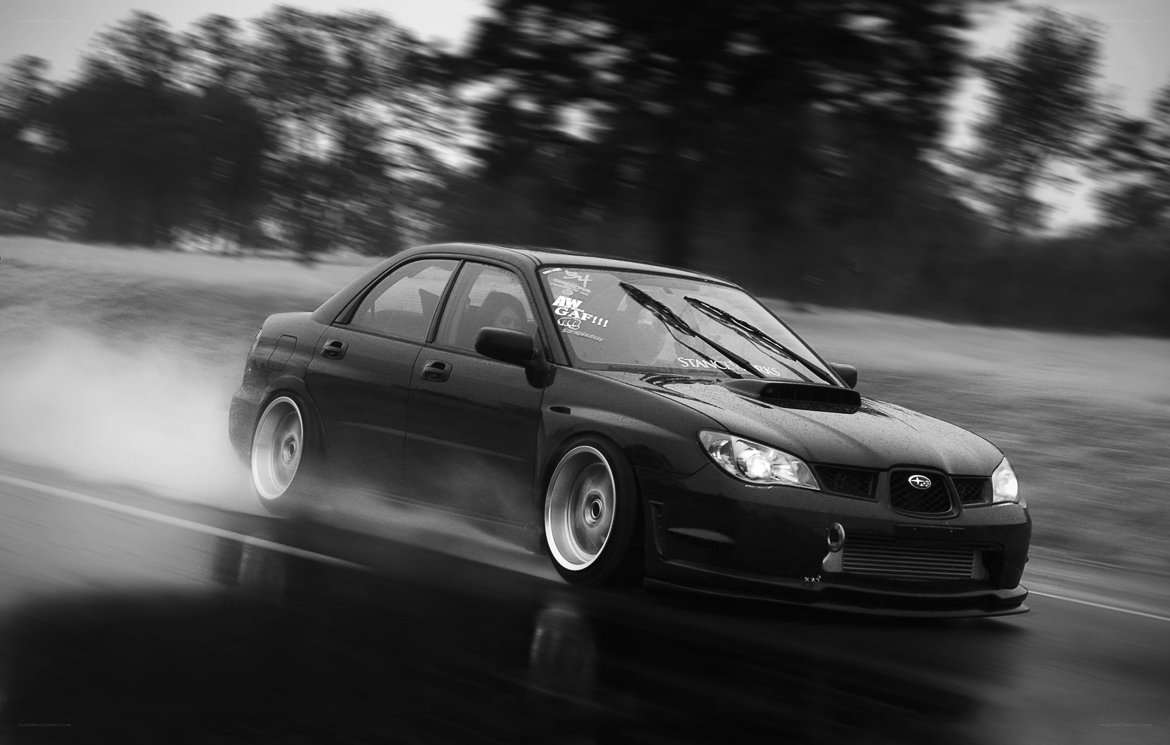 drifting car on wet road