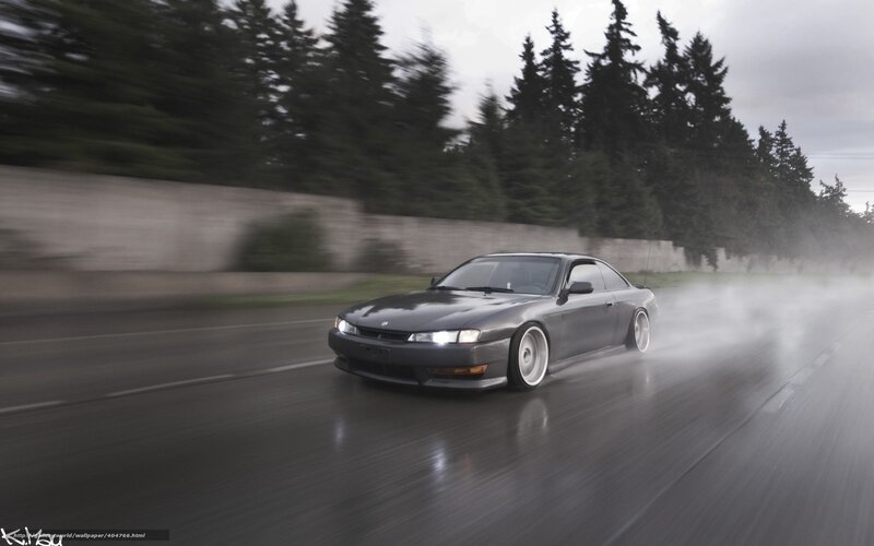 drifting car on wet road