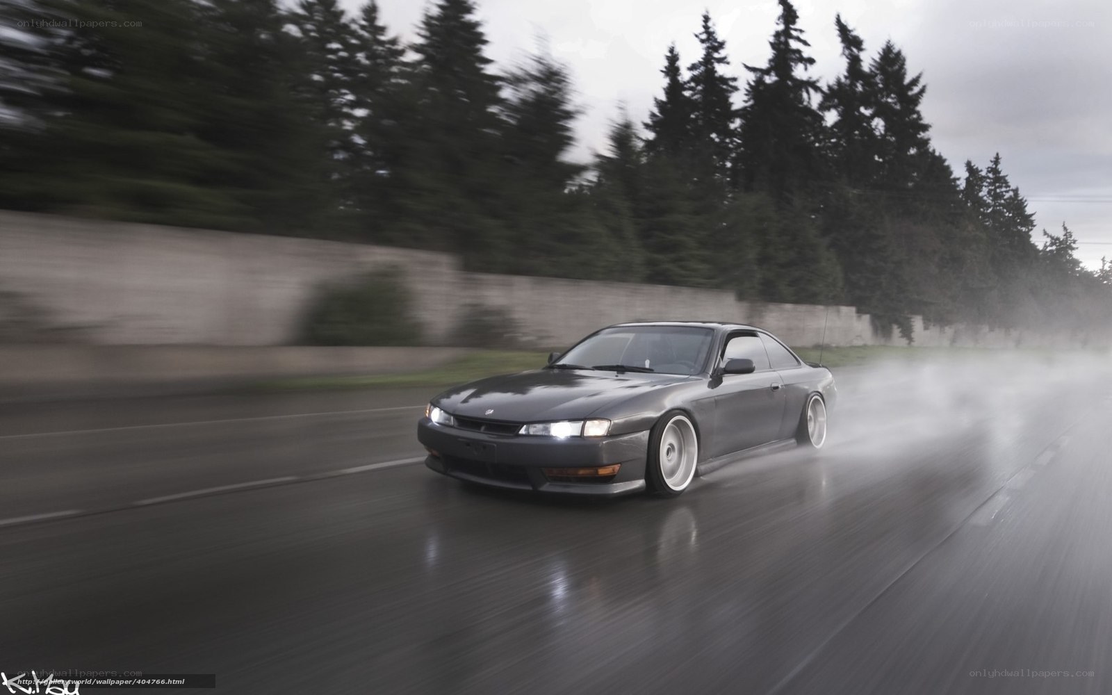 drifting car on wet road