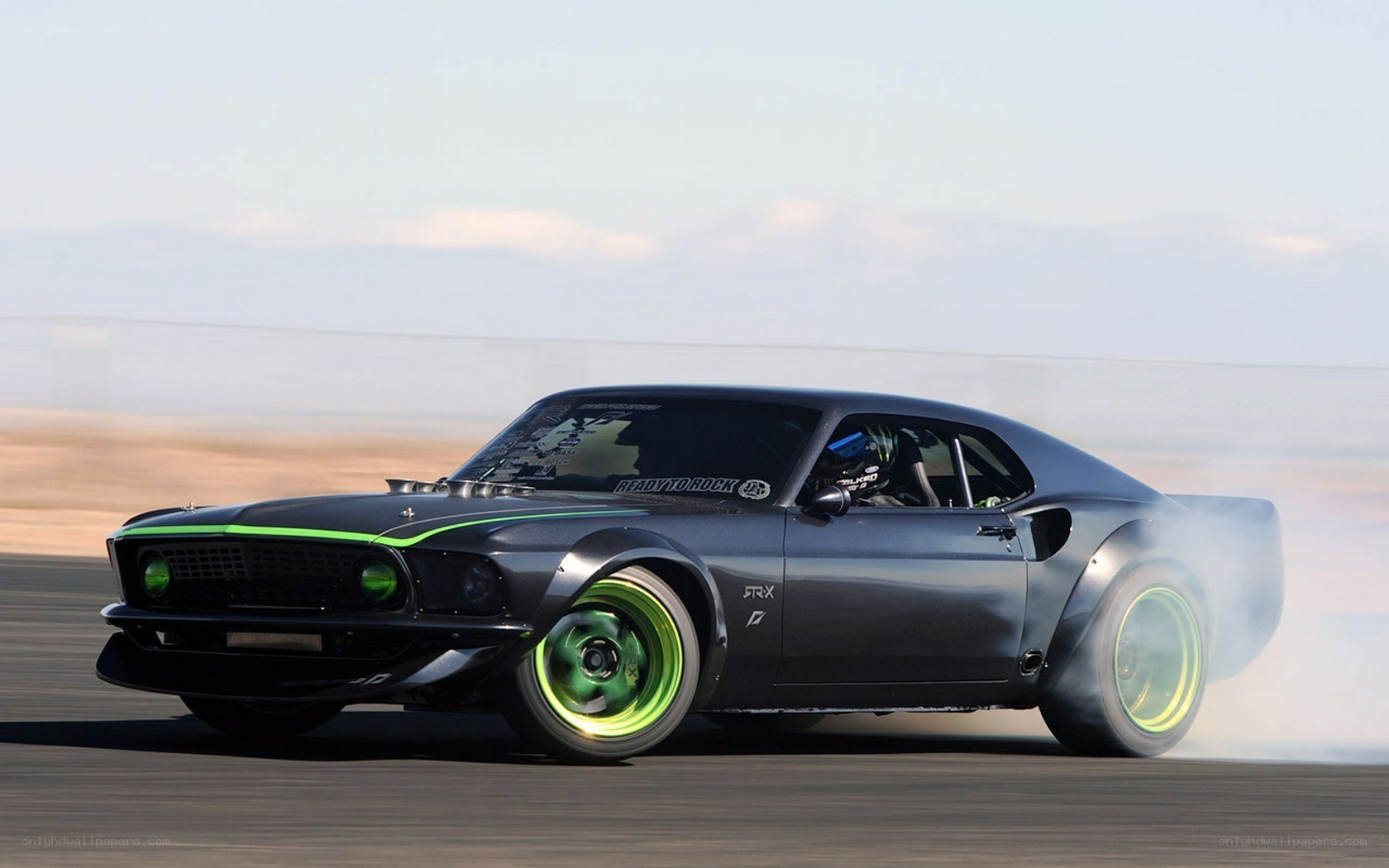 drifting classic muscle car