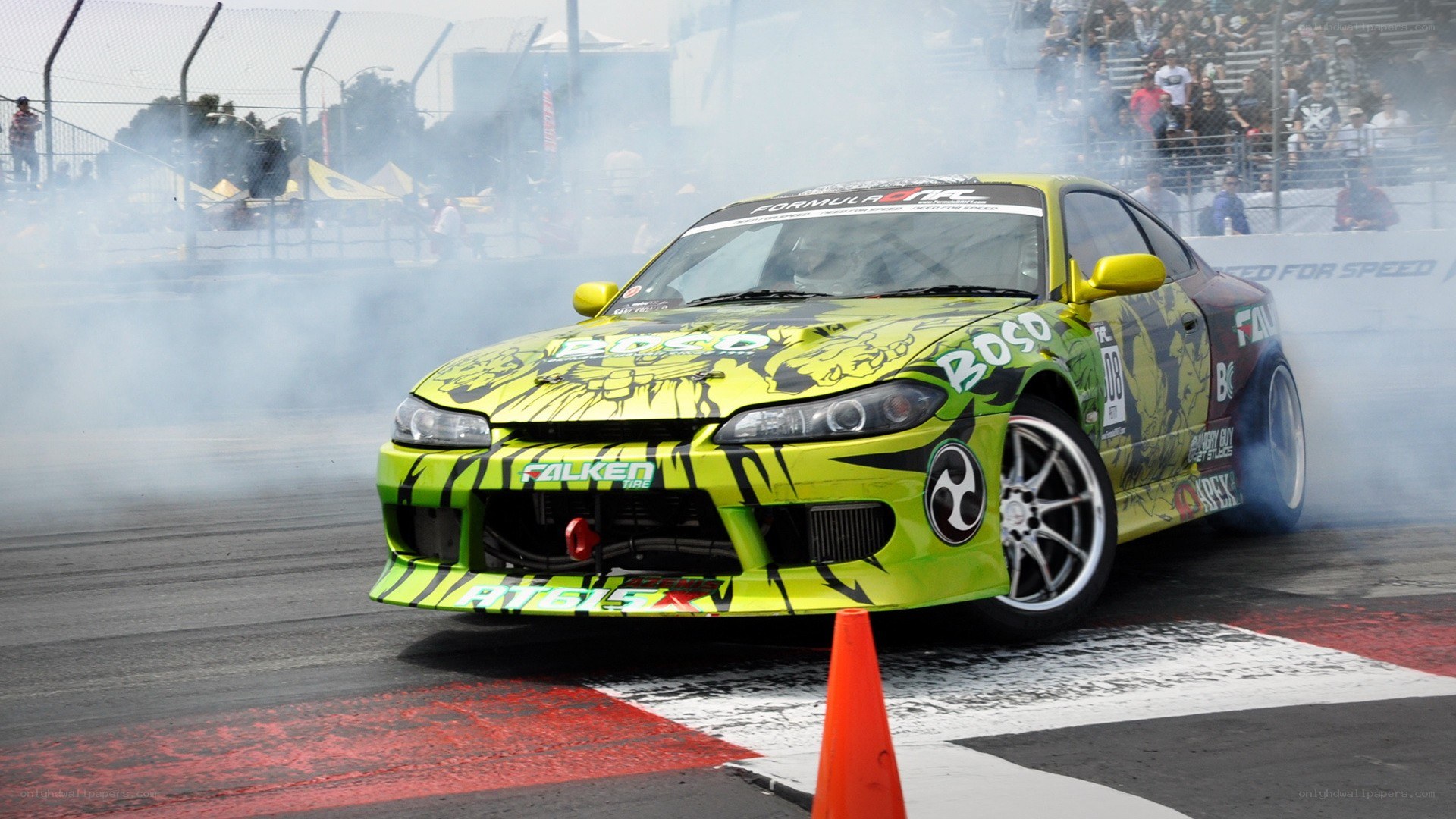 Drifting green race car