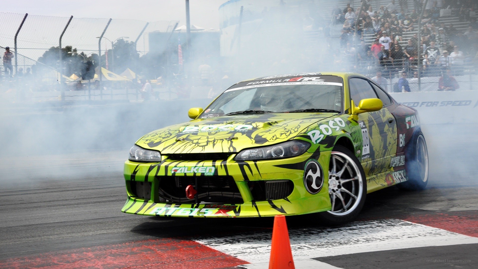 Drifting green race car