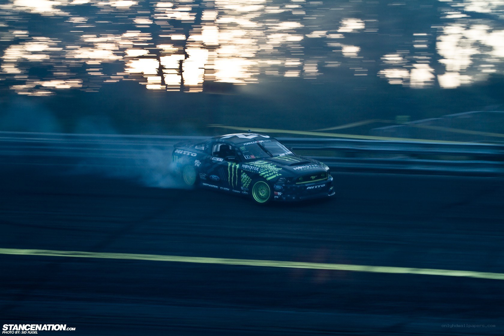 drifting race car at night
