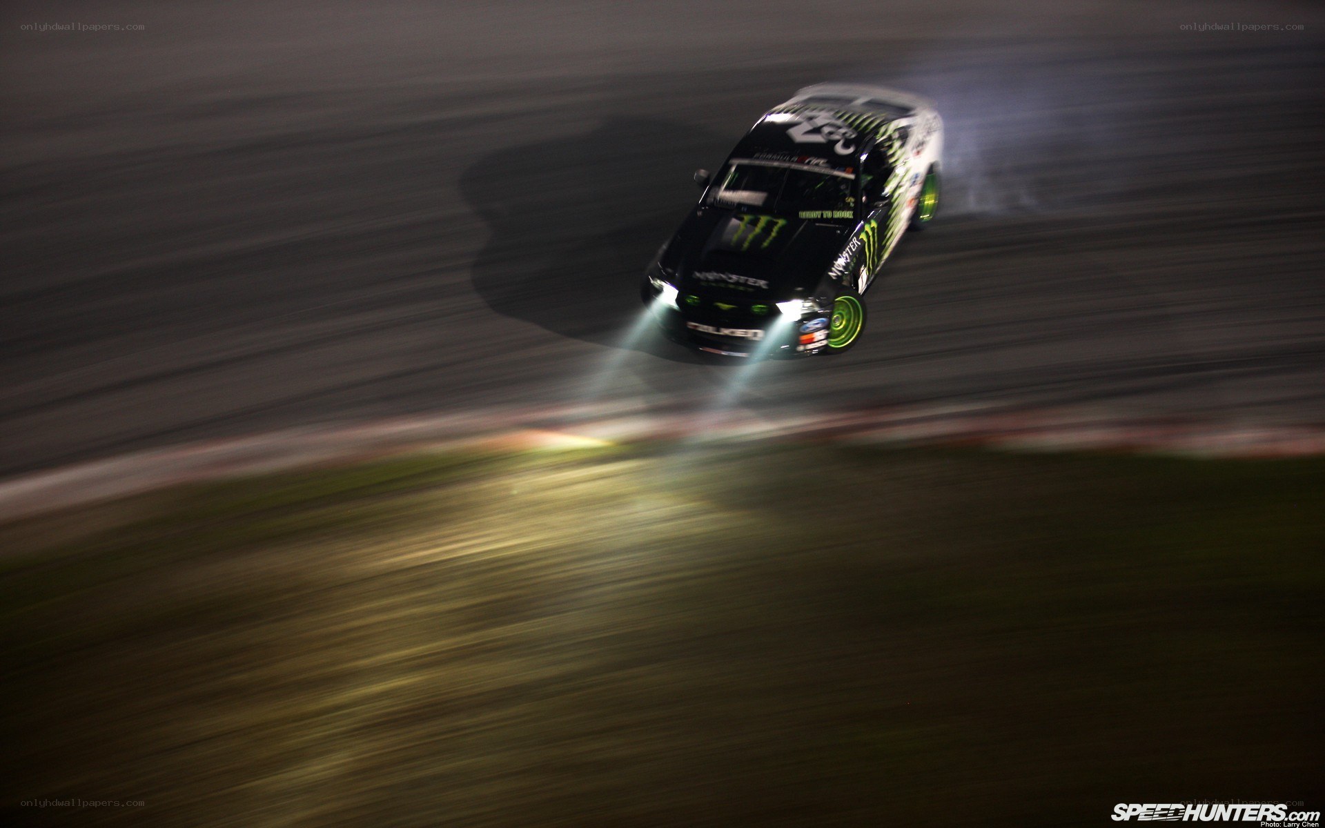 Drifting race car at night