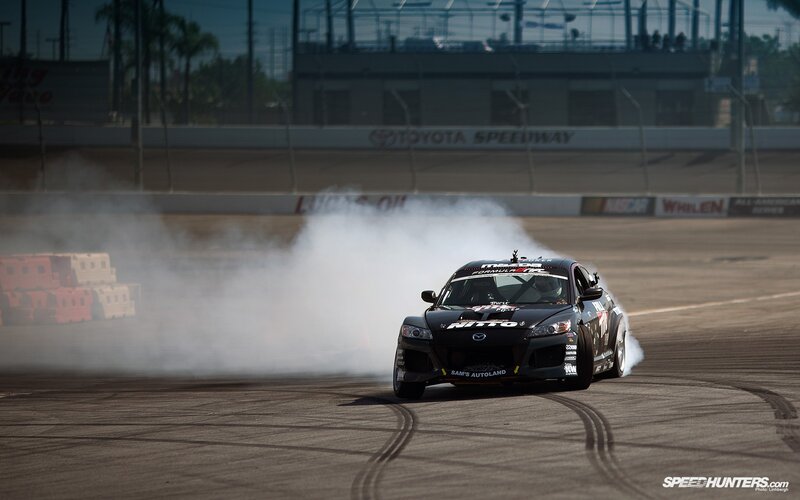 Drifting race car at Toyota Speedway
