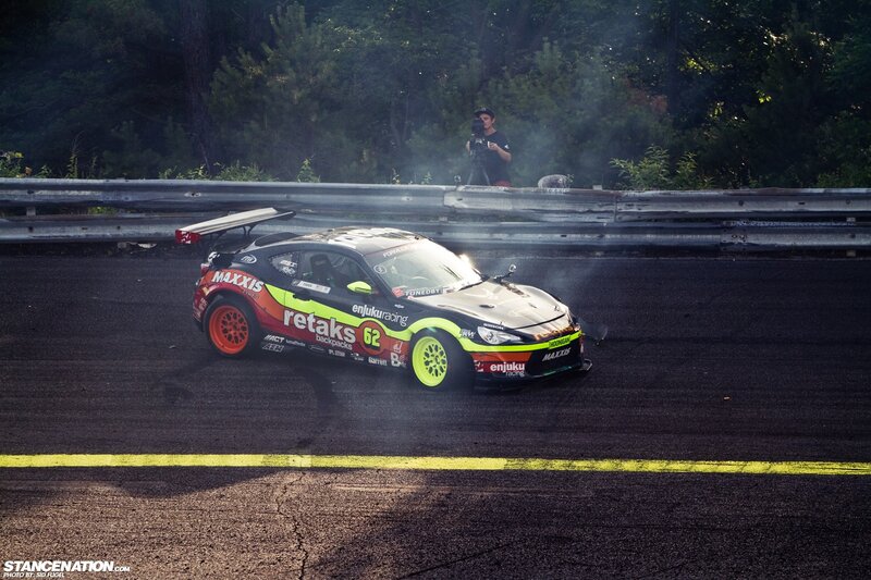 Drifting Race Car — Black, Dramatic, Afternoon, Photograph, Person