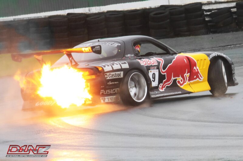 Drifting Race Car — Black, Dramatic, Photograph, Fire