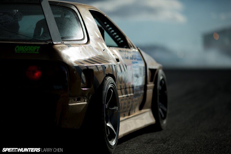 Drifting Race Car — Black, Dramatic, Photograph, Race Track