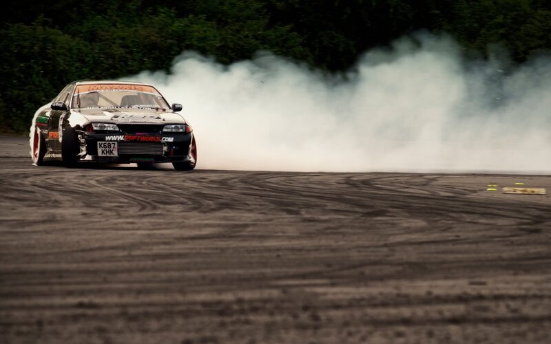 Drifting Race Car — Black, Dramatic, Photograph, Smoke