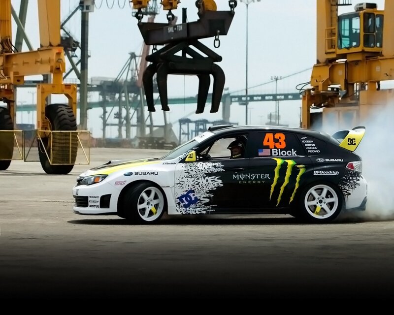 Drifting Race Car — Black, Dynamic, Afternoon, Photograph, Cranes