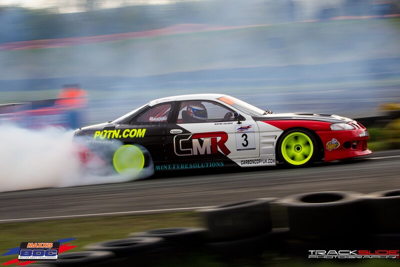 Drifting Race Car — Black, Dynamic, Afternoon, Photograph, Driver, Tire Smoke, Track