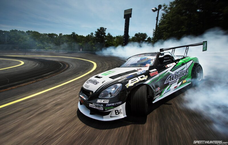 Drifting Race Car — Black, Dynamic, Afternoon, Photograph, Smoke, Racetrack, Trees
