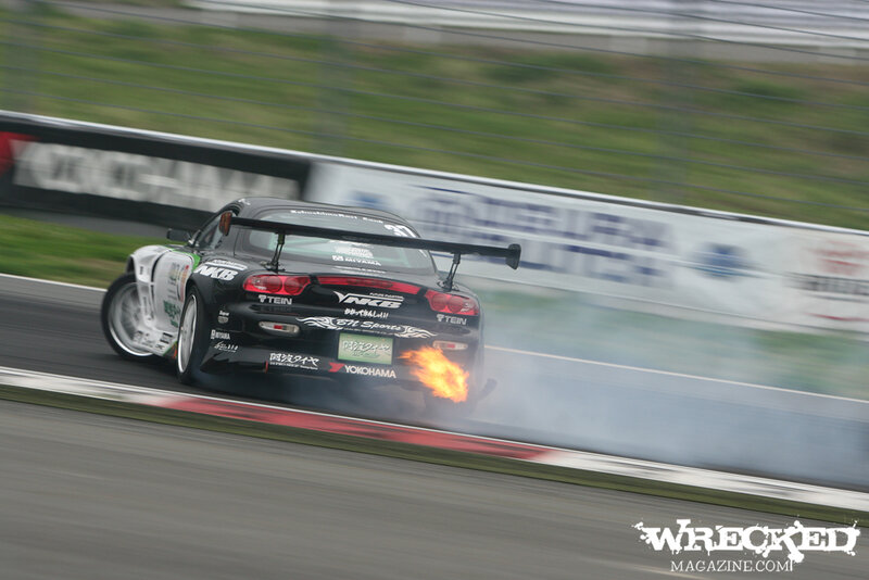 Drifting Race Car — Black, Dynamic, Photograph, Fire