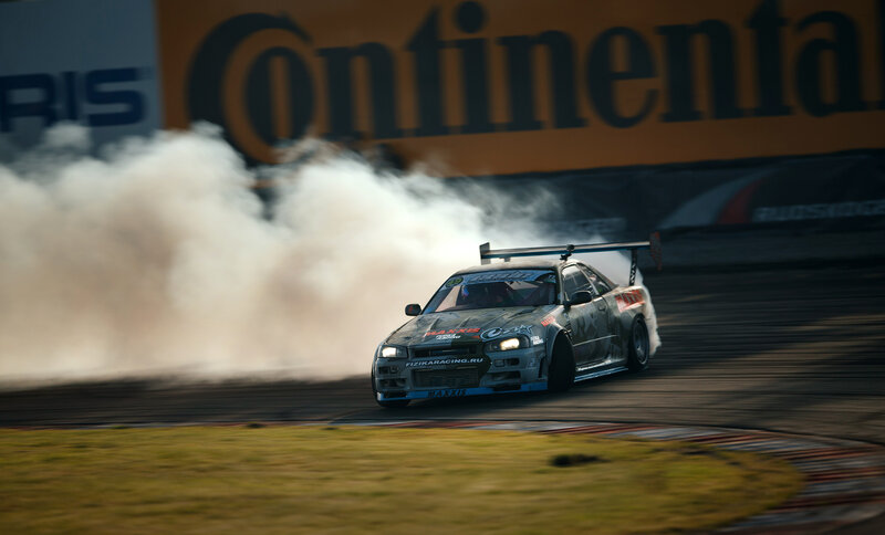 Drifting Race Car — Gray, Dramatic, Afternoon, Photograph, Smoke, Track