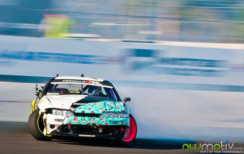 Drifting race car in action