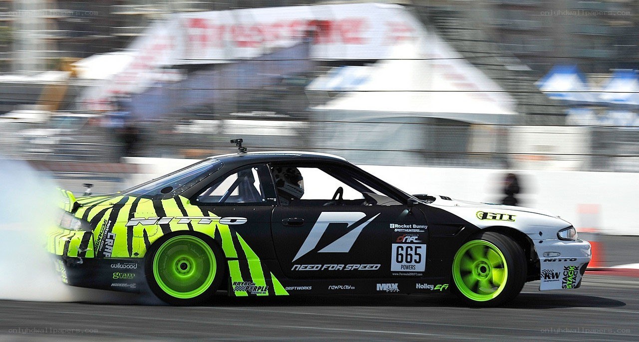 Drifting race car in action