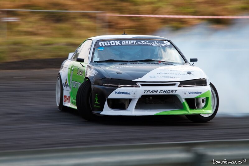 Drifting race car in action
