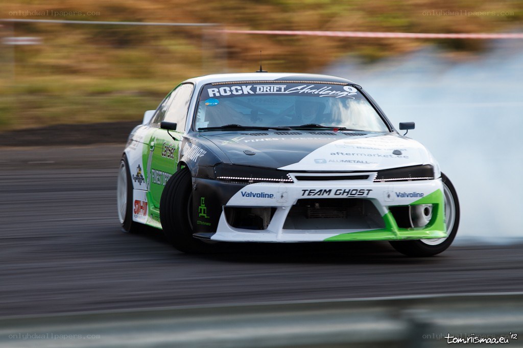 Drifting race car in action