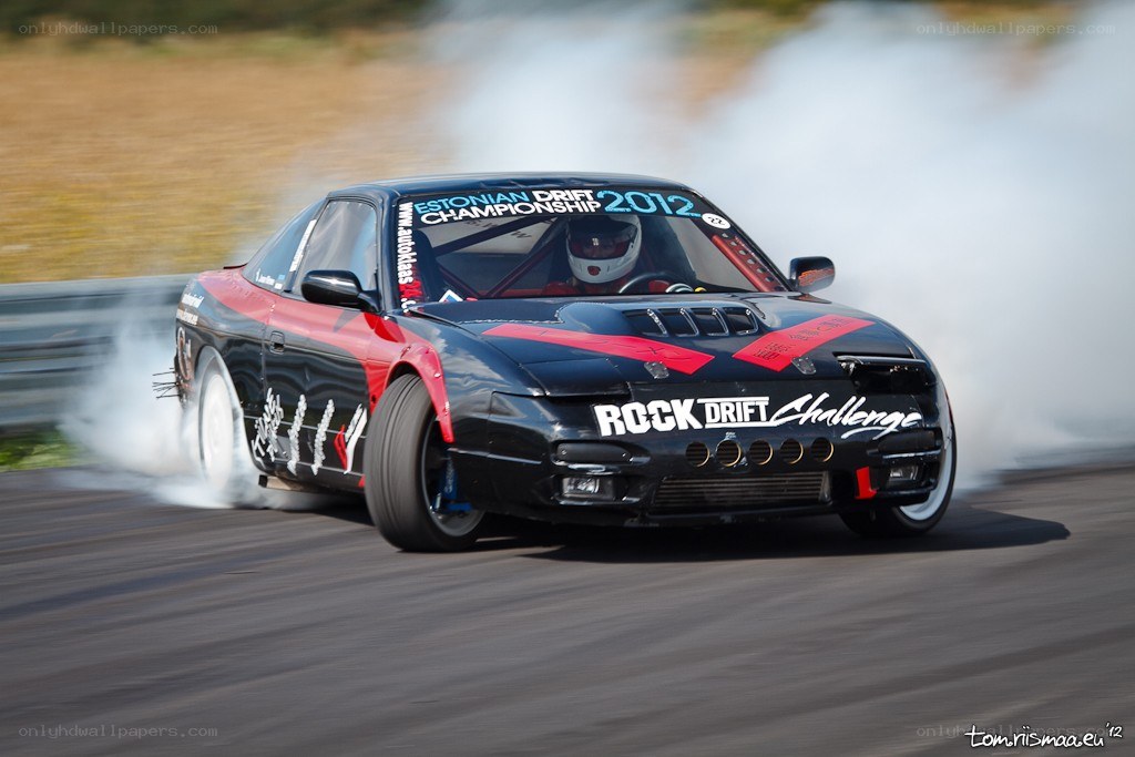 Drifting race car in action