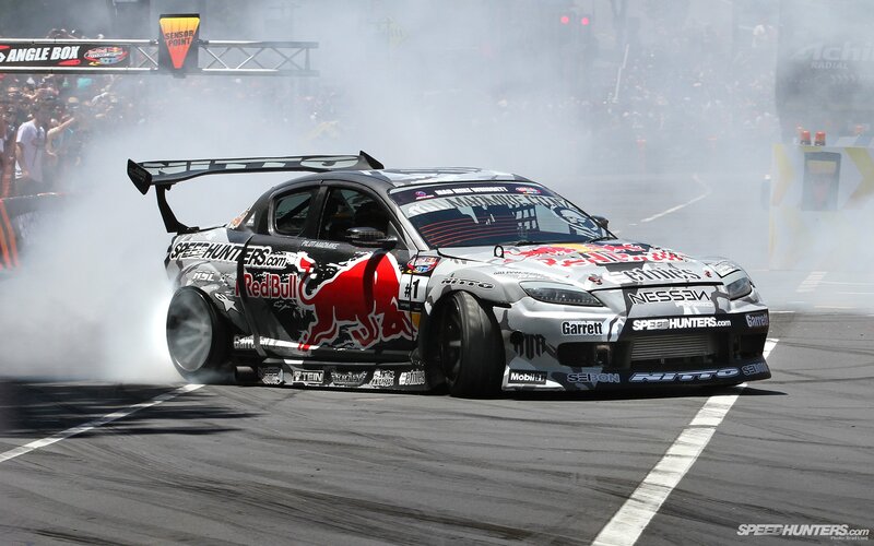 Drifting race car in action