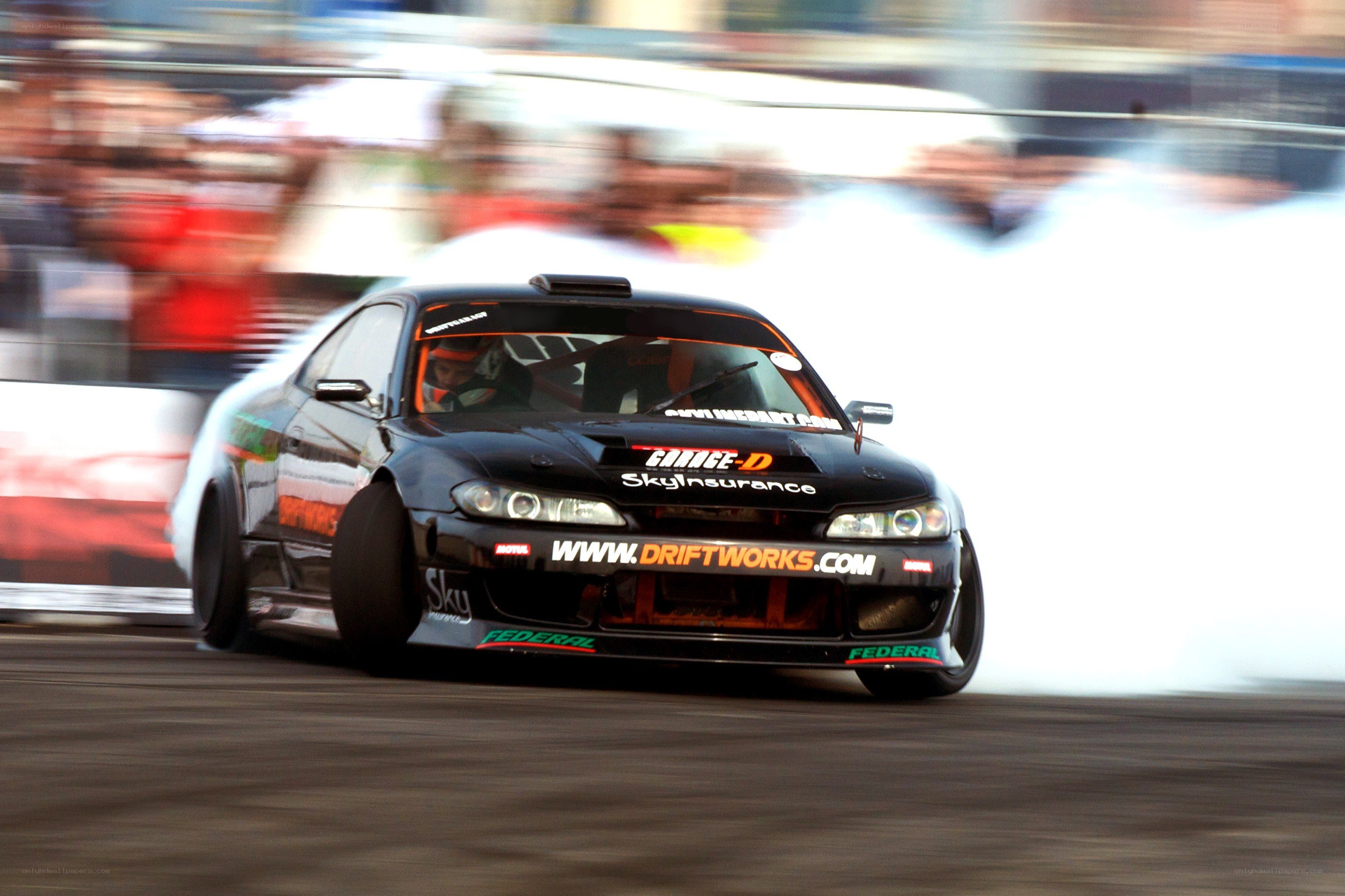 Drifting race car in action