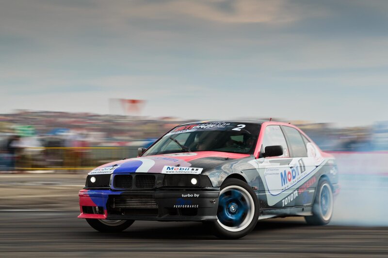 Drifting race car in action