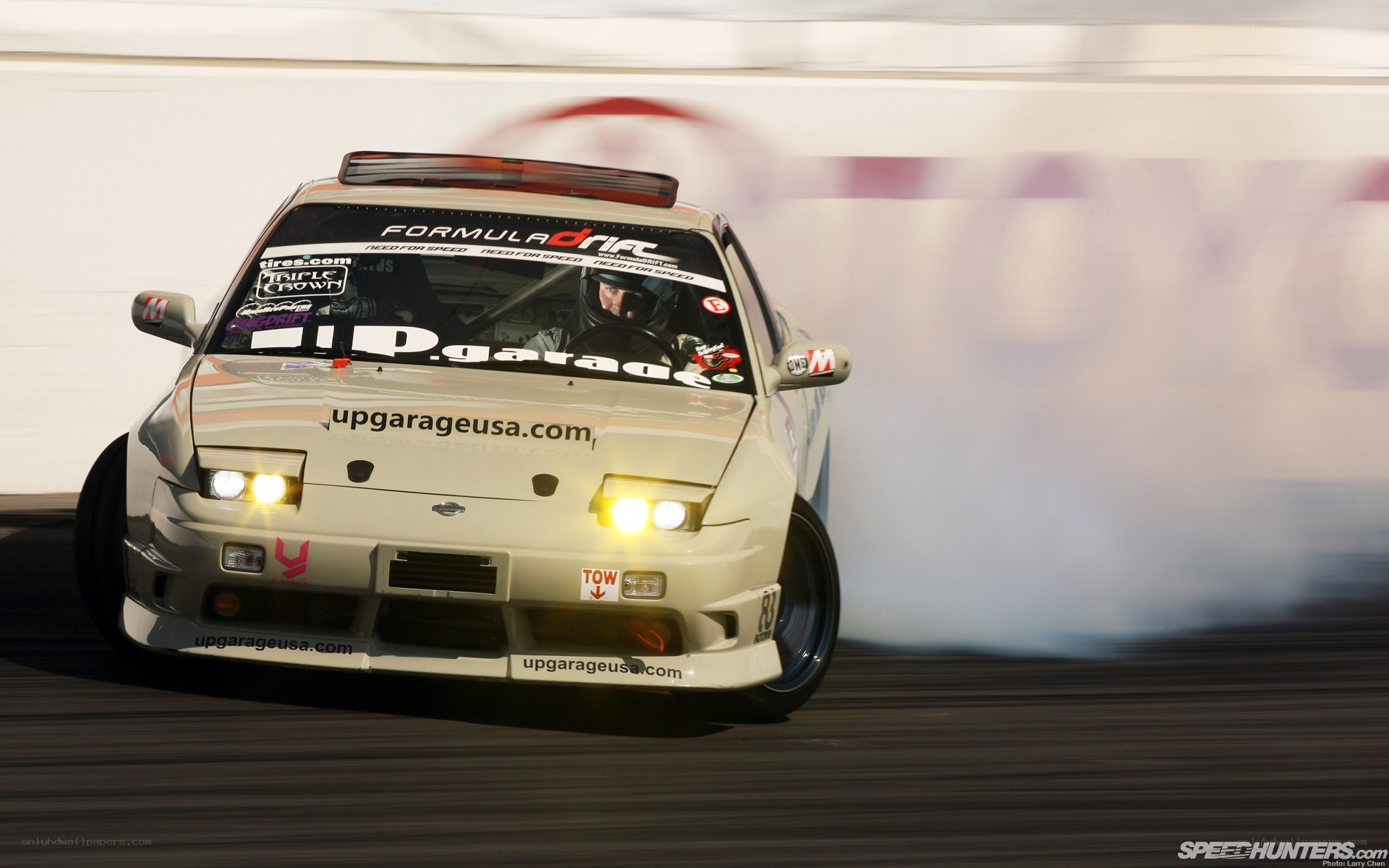 Drifting race car in action