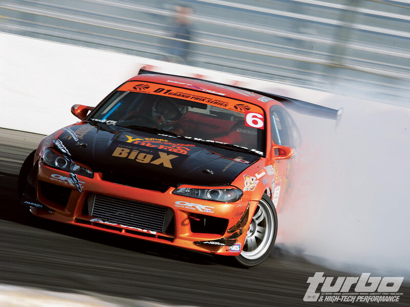 Drifting race car in action