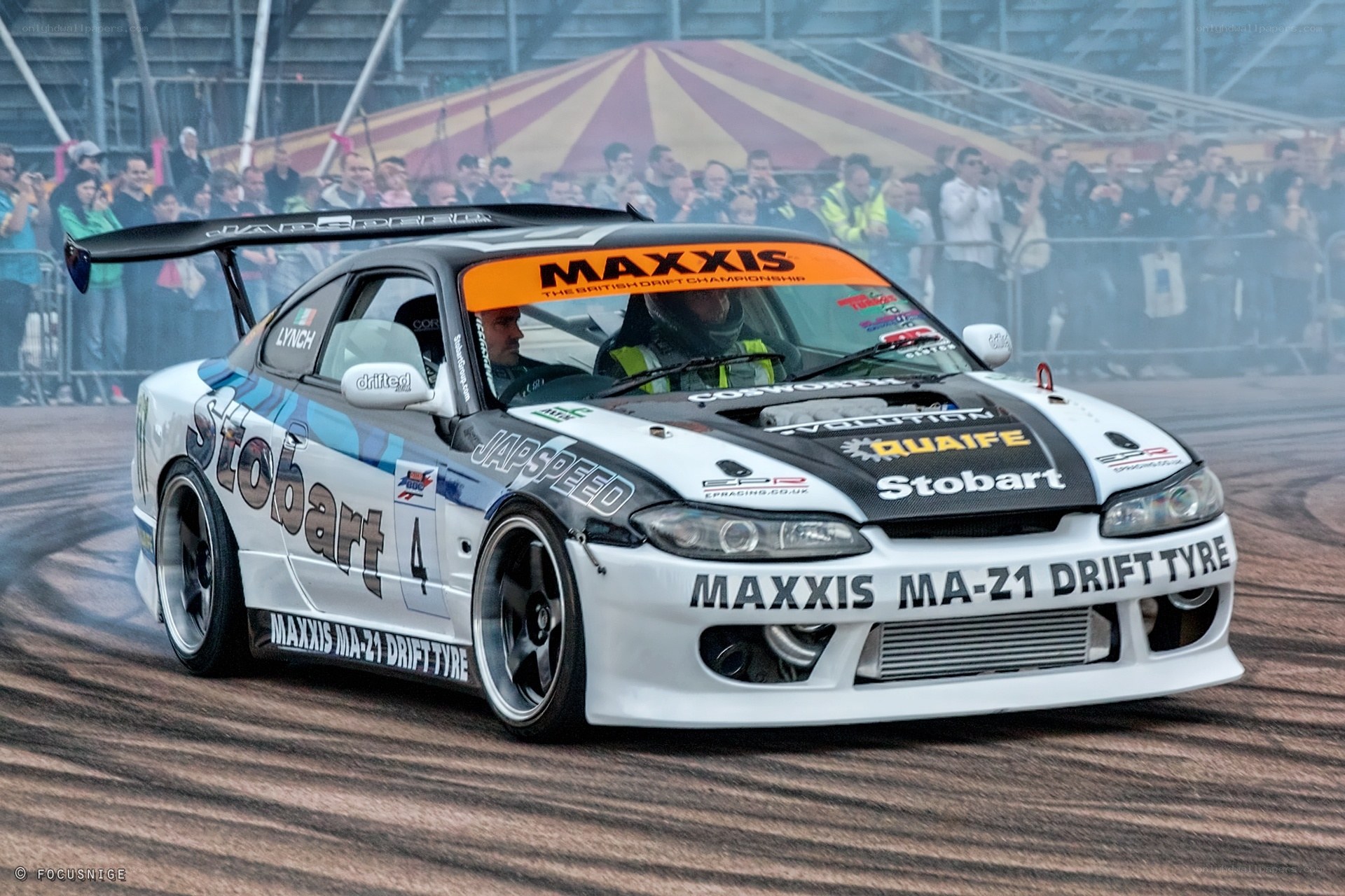 Drifting race car in action
