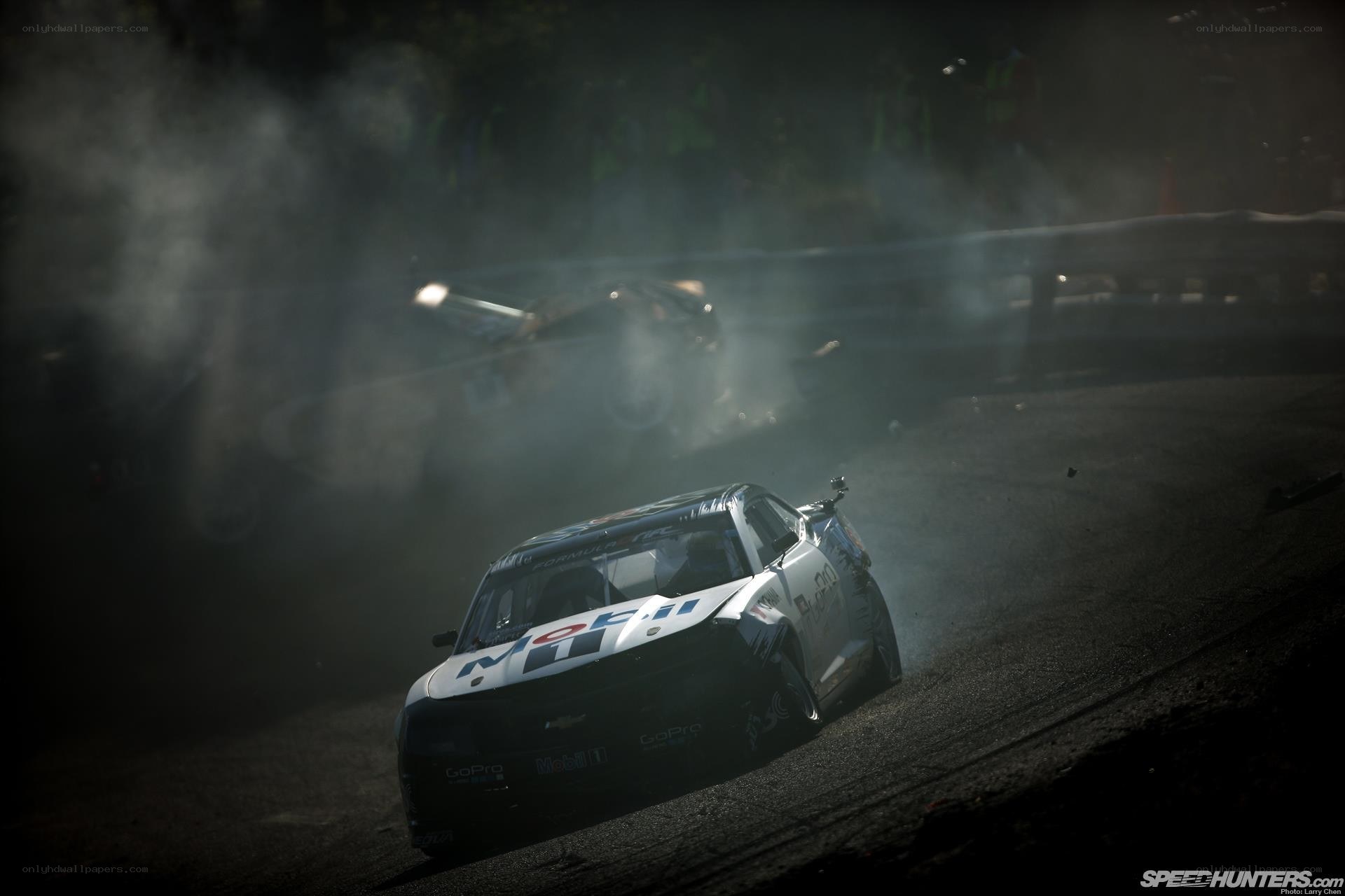 Drifting race car in smoke