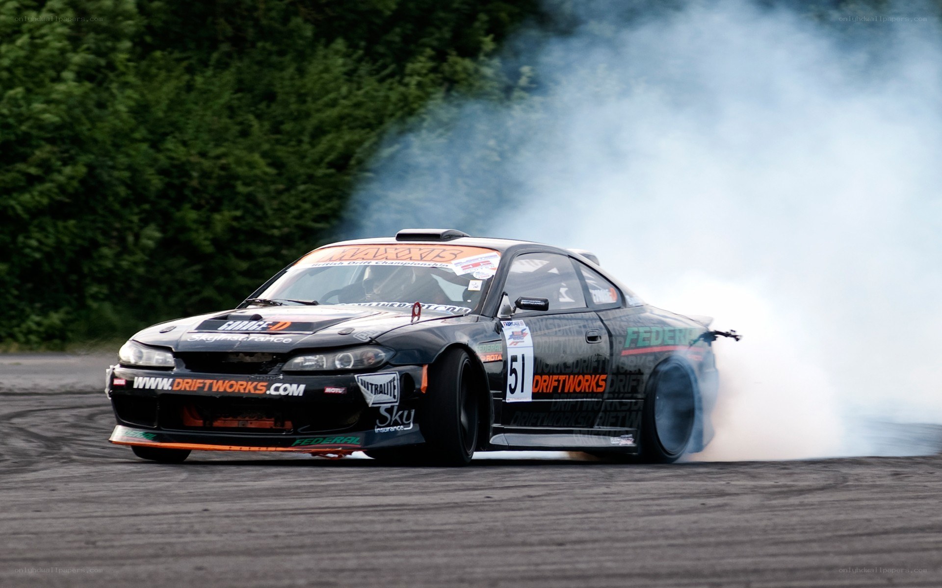 Drifting race car on track