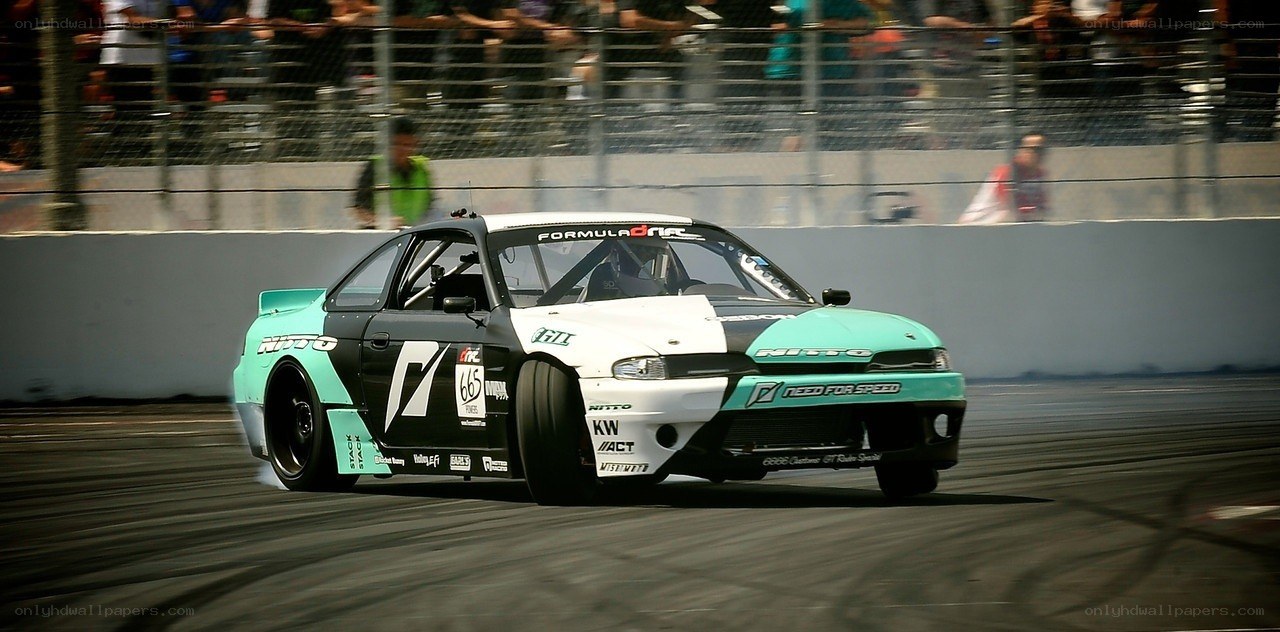 Drifting race car on track