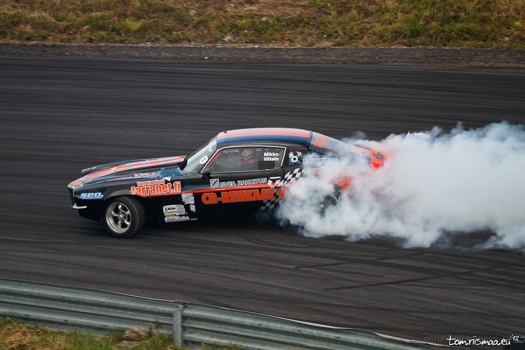 Drifting race car on track